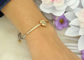 Elegancka bransoletka damska Nomination Italy Milleluci z zawieszką w kształcie koniczynki 028018 006. Stal szlachetna platerowana złotem, wysadzana cyrkoniami, regulowana długość 14–19 cm. Idealn (4).jpg